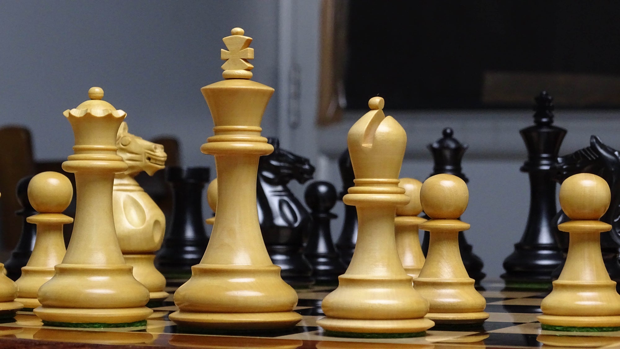 The 4 Inch Supreme Series Staunton Weighted Chess Pieces in Black Ebonized Wood & Boxwood - 1100 grams